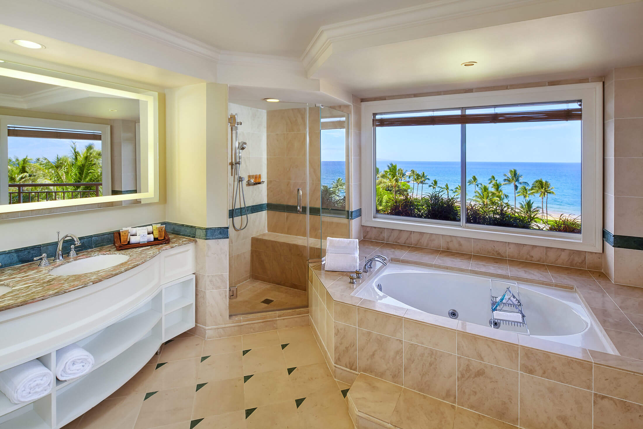 bathroom with panoramic views from tub and sink in the Signature Suite