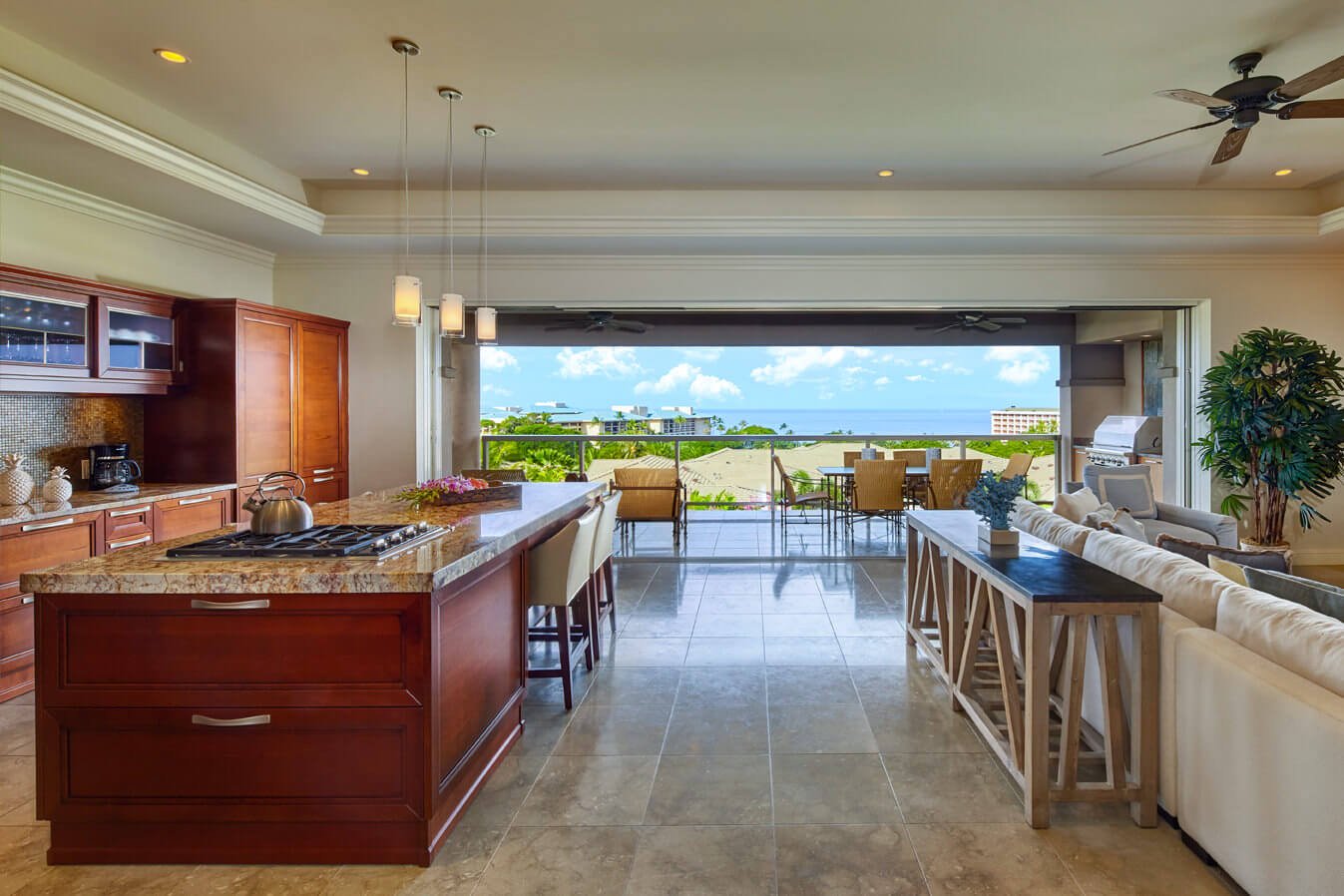 seating area and kitchen in the Ho'olei Villias