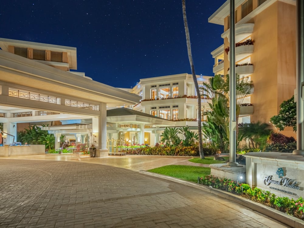 view of the Grand Wailea entrance lit up at night