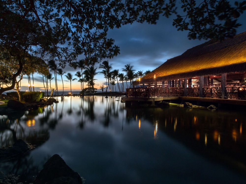 sunsets over the water beside the humuhumunukunukuapua'a restaurant