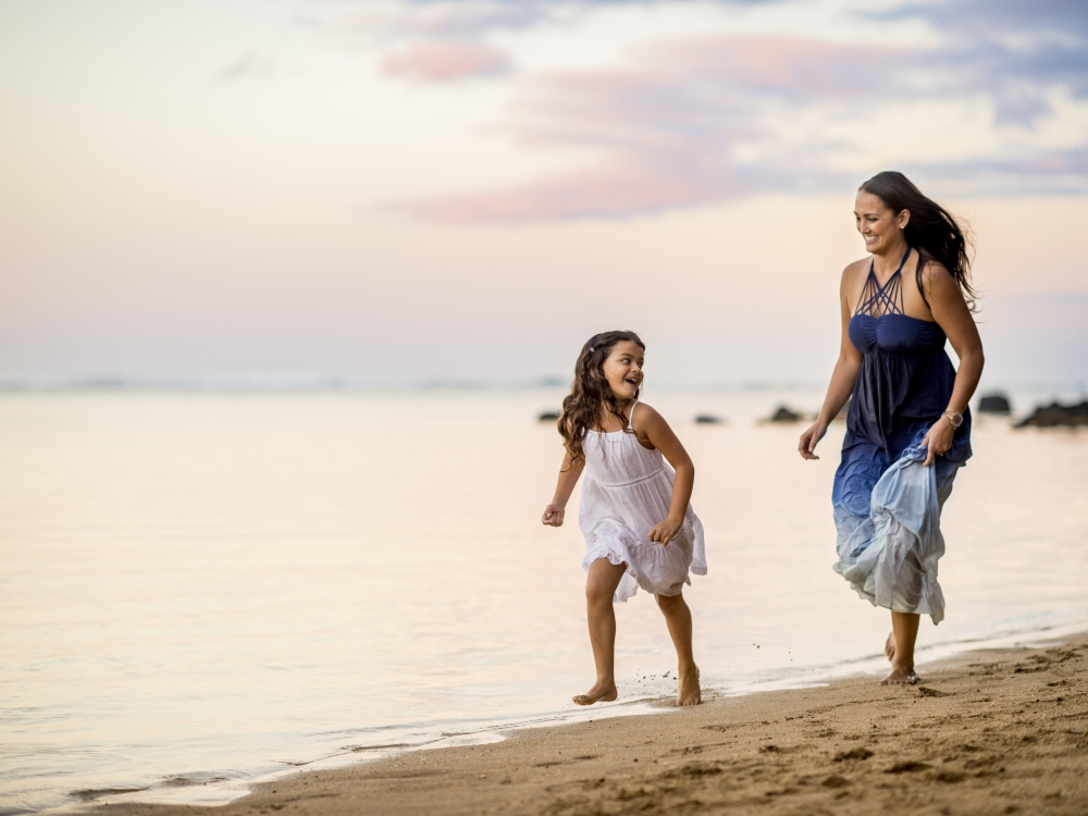 mom and daughter on beach