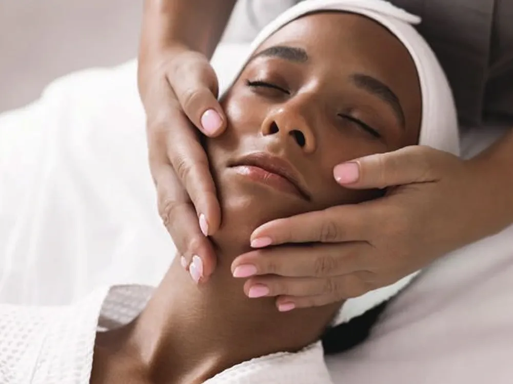 women receiving facial massage