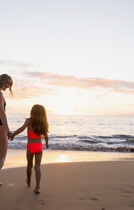 mom and daughter on beach