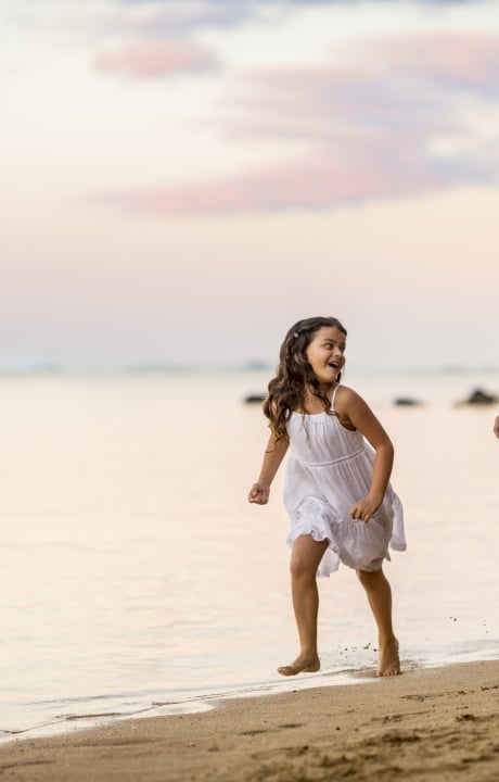 mom and daughter on beach