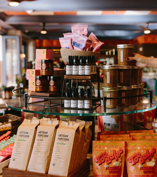 Erewhon products such as Artisan popcorn, Nut Butters, Elixirs and vitamin C packets inside of Loulu within the Grand Wailea
