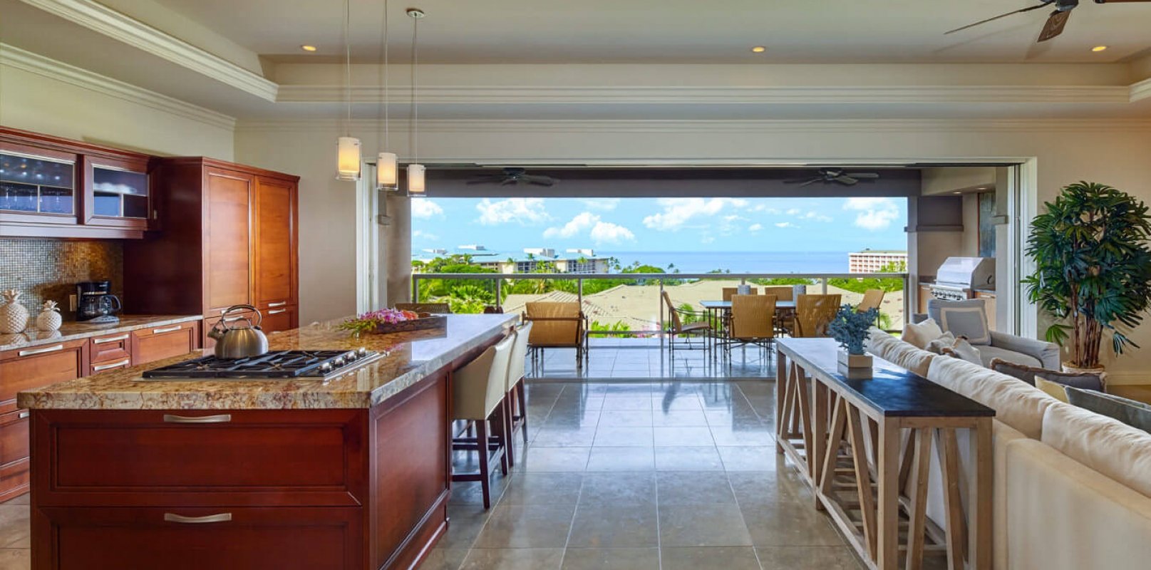 seating area and kitchen in the Ho'olei Villias