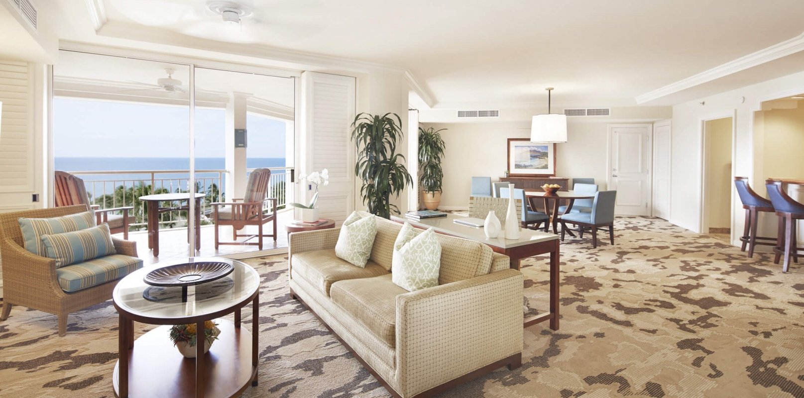 seating area in Signature suite overlooking the ocean