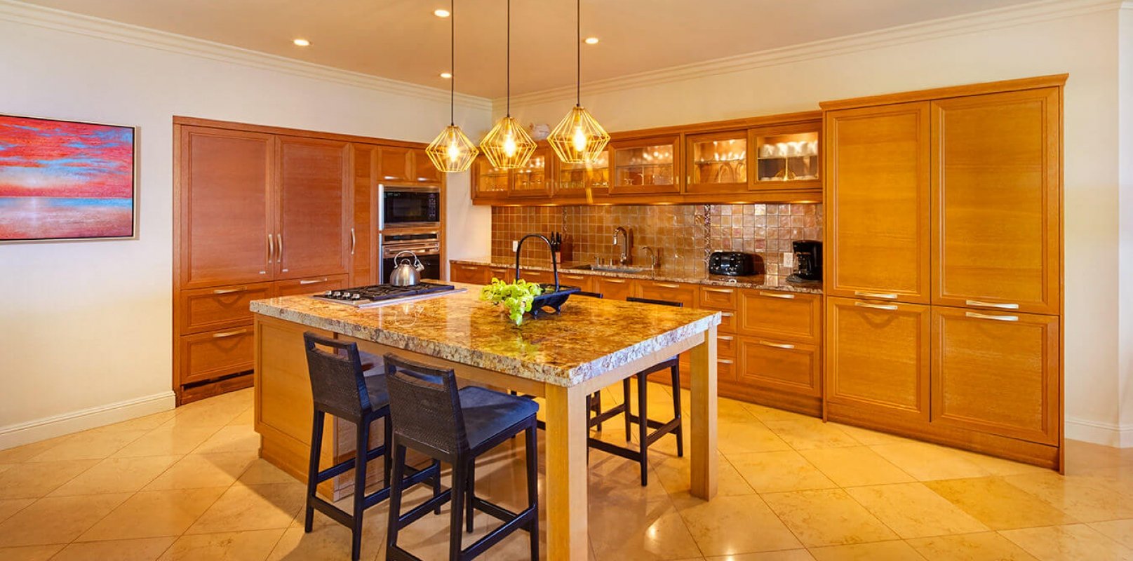 seating area and kitchen in the Ho'olei Villias