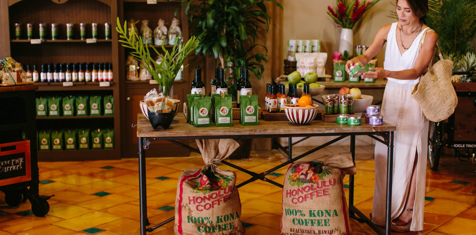 a woman shops inside Cafe Kula storefront 