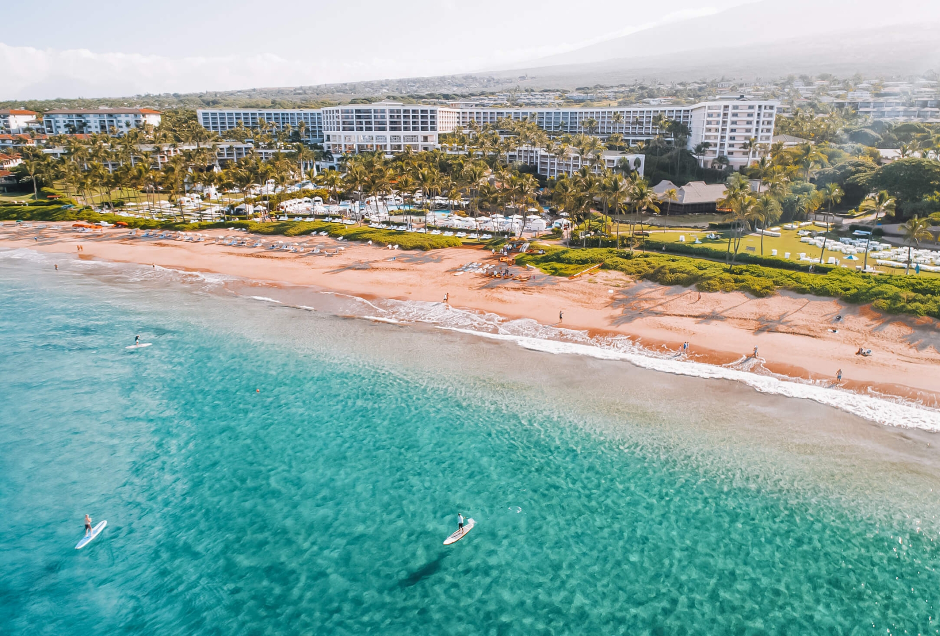 aerial view of the ocean, beach, and island of Maui