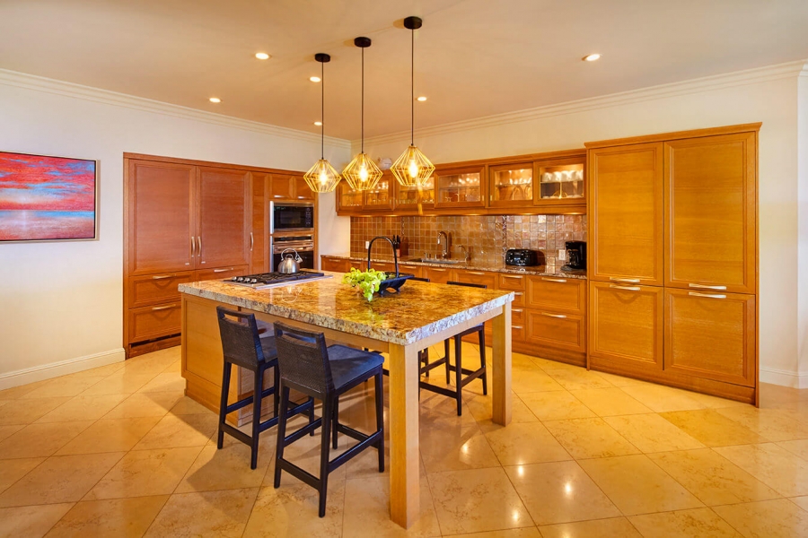 seating area and kitchen in the Ho'olei Villias
