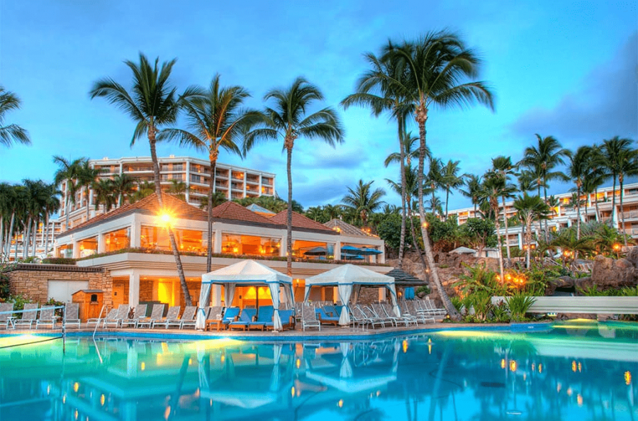 exterior view of Molokini Coastal restaurant with pool in foreground