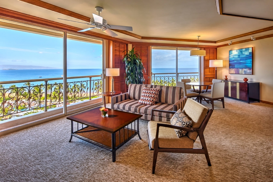 seating area in Napua club suite overlooking the ocean