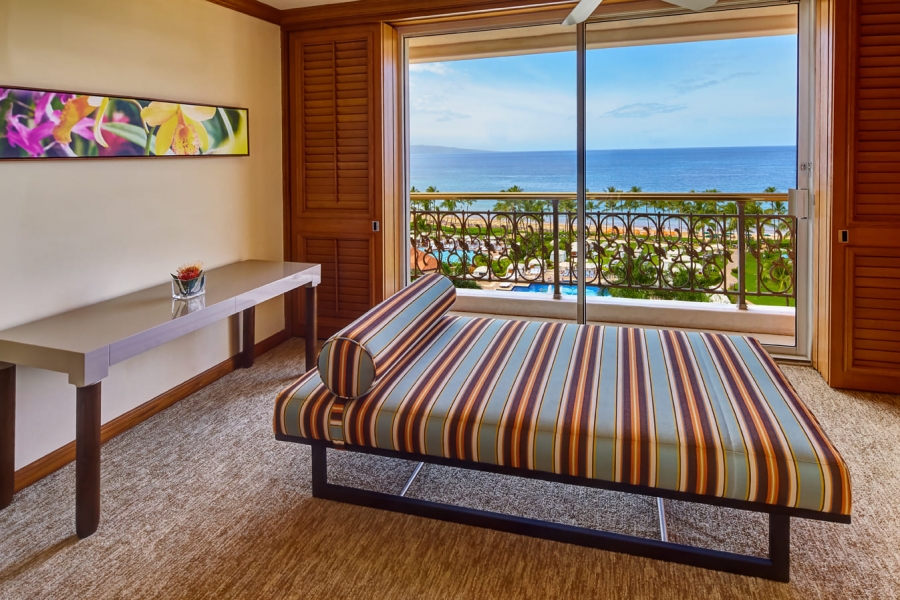 lounge area in Napua club suite overlooking the ocean