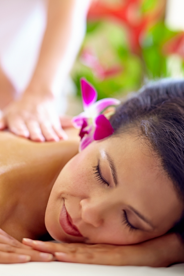 A women looking peaceful as she gets a massage