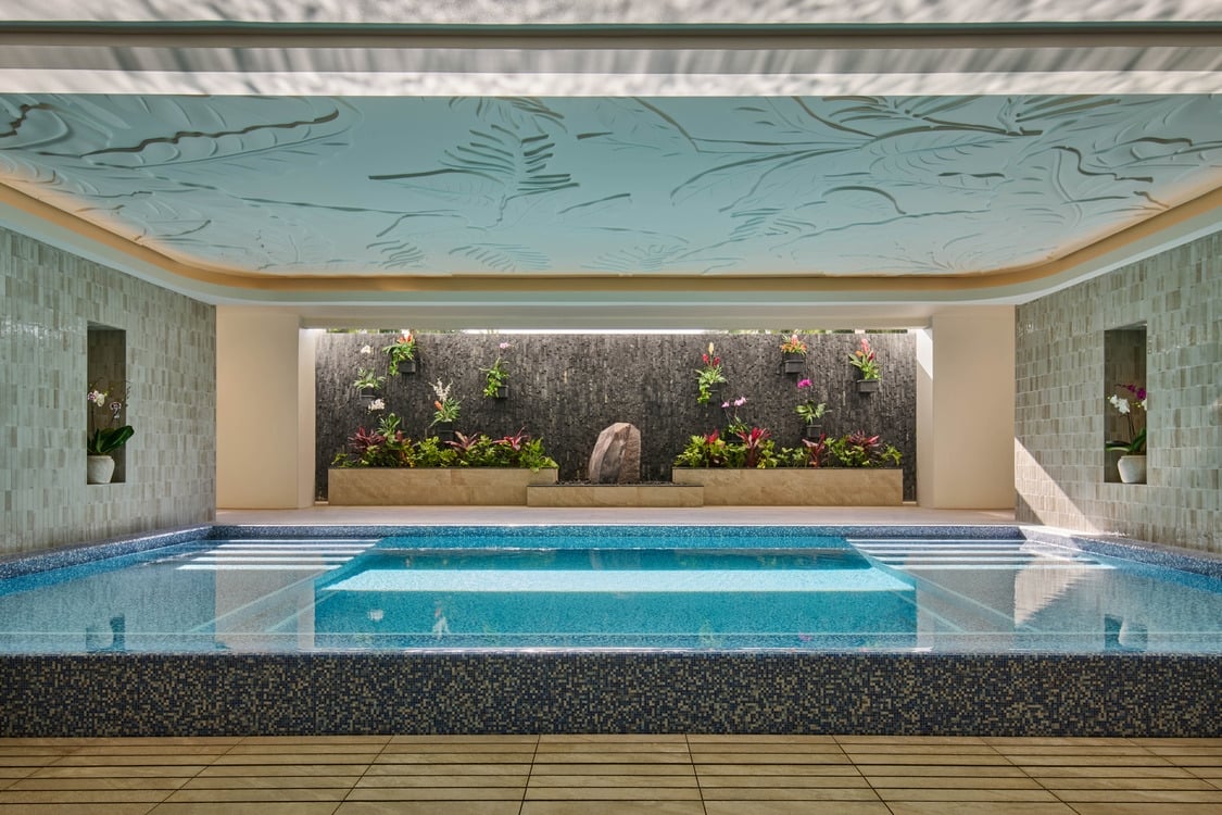The Kilolani Spa Vitality Pool, with vibrant blue water in a calm, inviting setting.